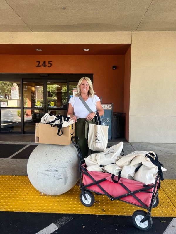 Kate Asbury delivering Chemo Care Baskets to a hospital